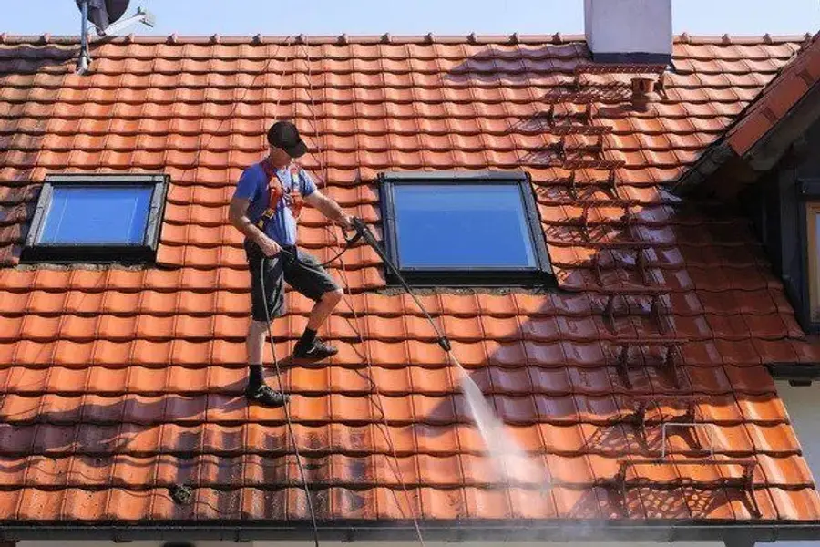 Removing loose debris from a residential roof